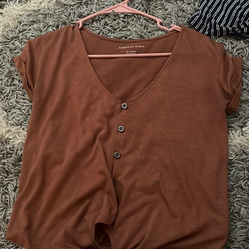 button shirt from american eagle, with a cute tie in the front